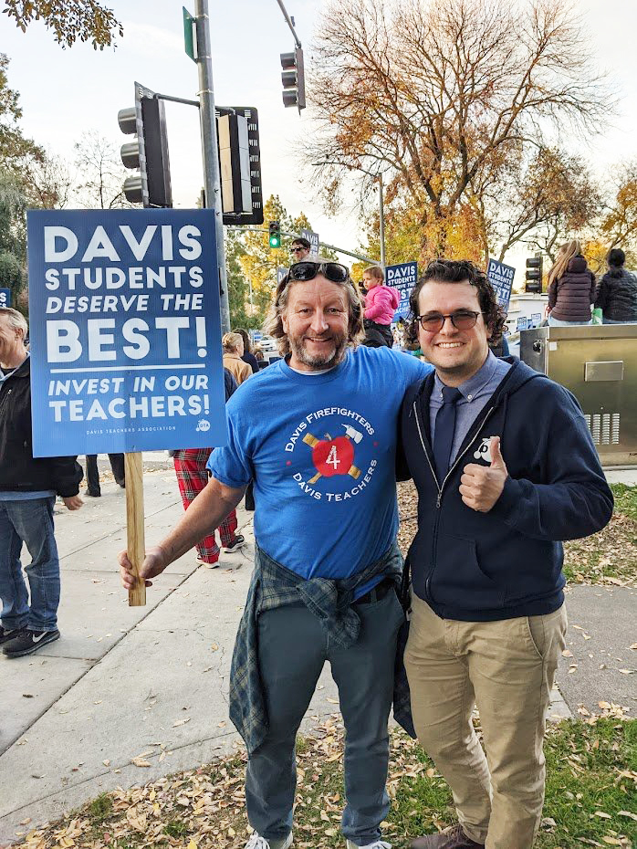 DTA President Victor Lagunes, right, with a Davis firefighter