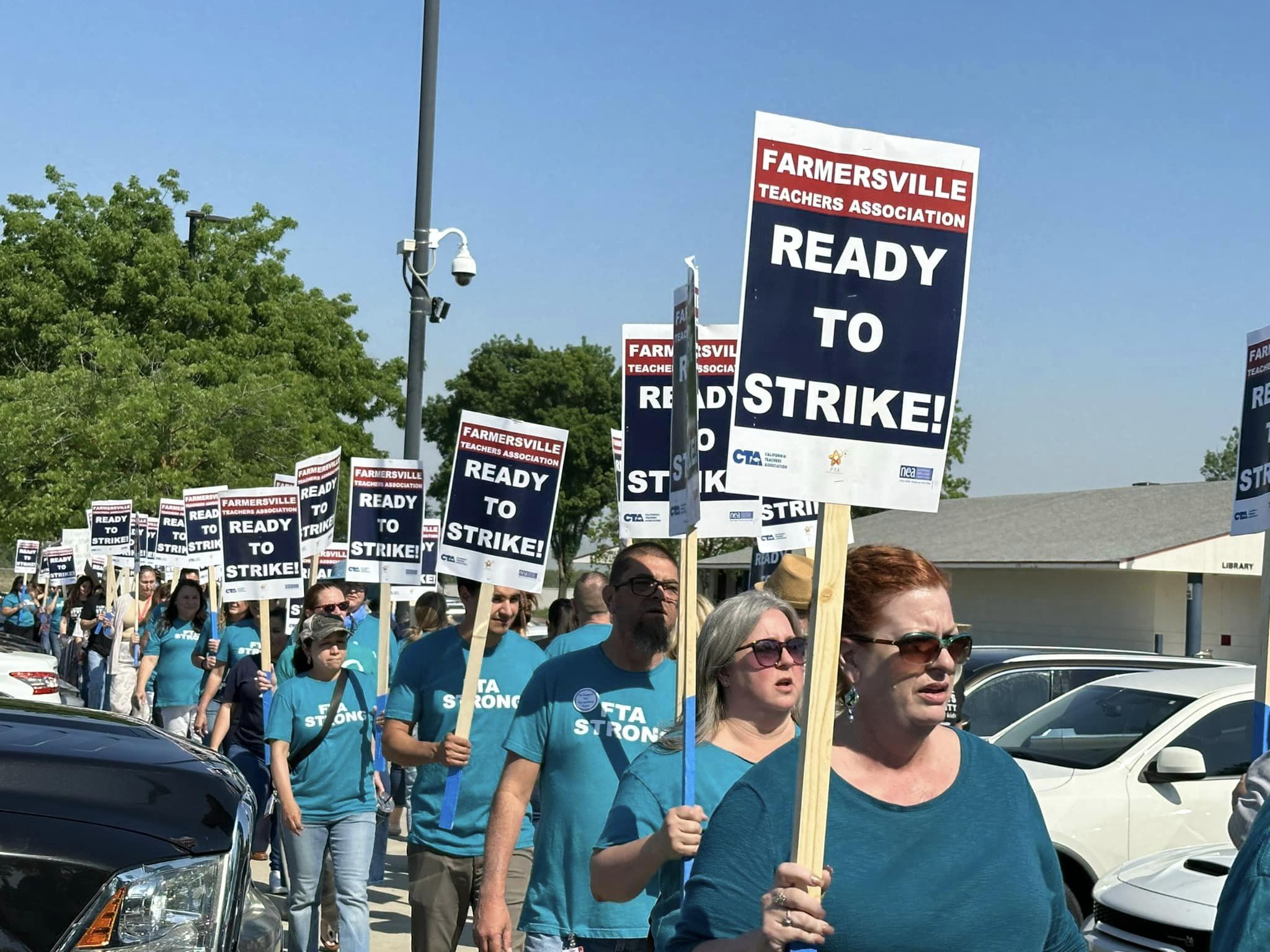FTA members fight for a new contract and to rescind layoffs.