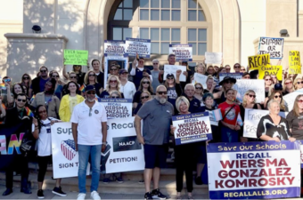 Photo of TVEA members holding signs for Temecula recall