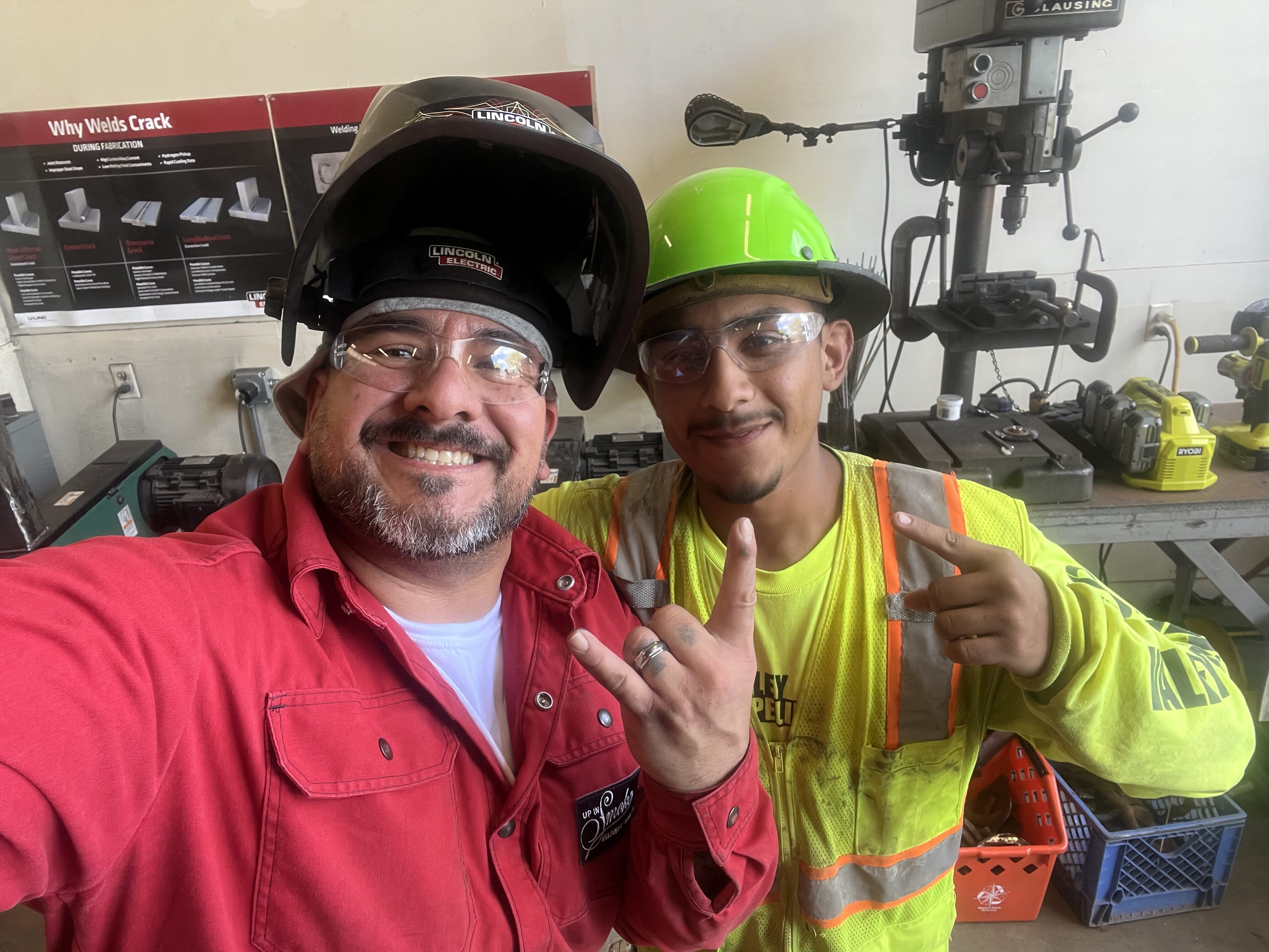 Hemet Teachers Association’s Josh O’Neal, left, with one of his students.