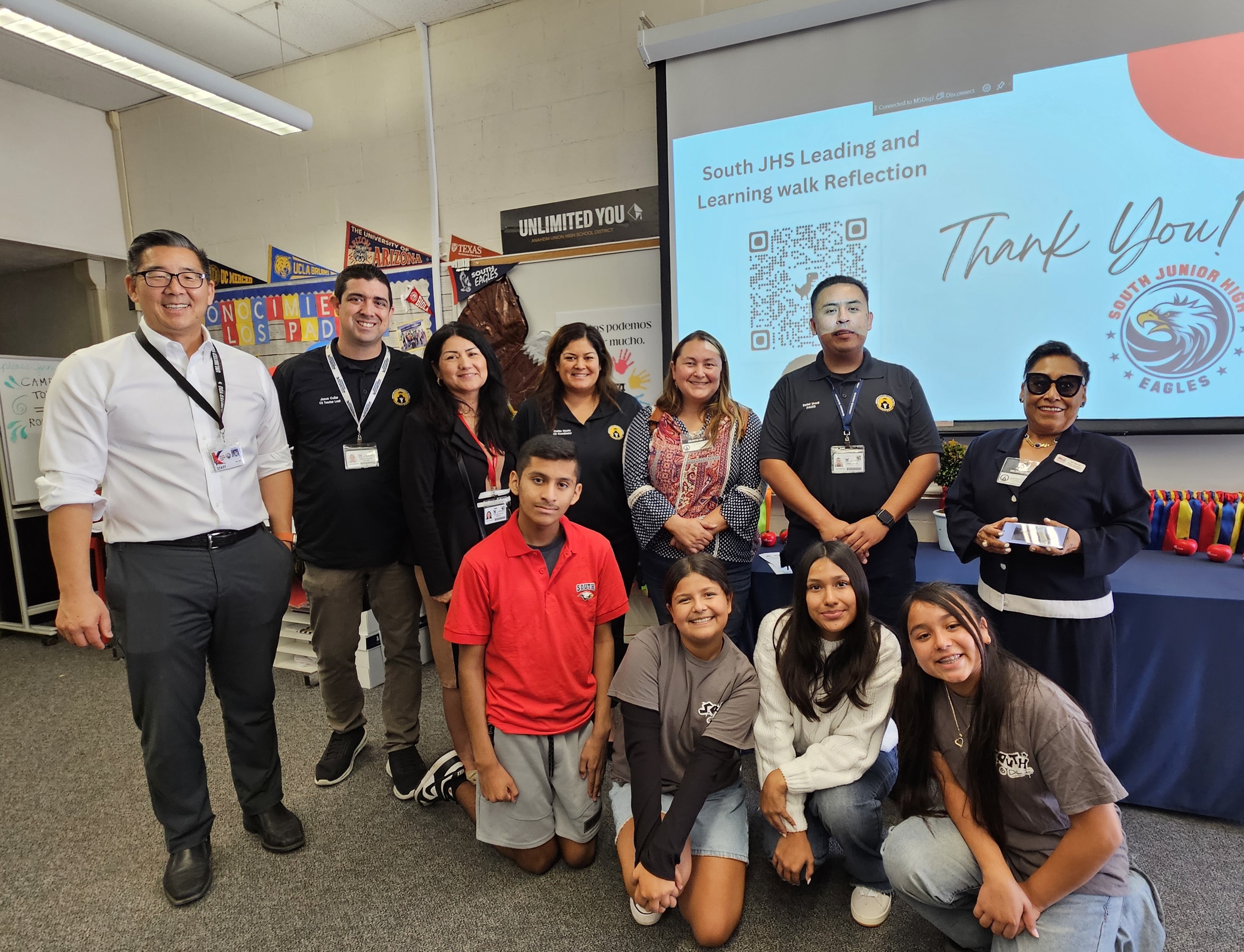 The Leading & Learning visit to South Junior High included a tour of an entrepreneurial “market” and club run by exceptional students (bottom left) and presentations by educators, staff, students, parents and community members (below).